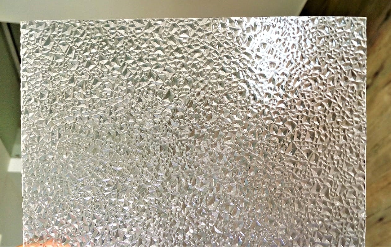 Embossed aluminium foil thermal insulation facing